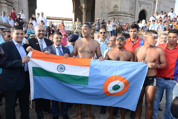 Shri M S Raghavan, CMD,  IDBI Bank felicitating India Air Force Channel Swimming team Delphinus for successfully completing Swimmathon, the record breaking longest open water swim  in India, also seen in the photograph Mumbai city FC players