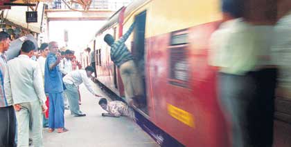 he slipped and fell in the gap between the train and the platform at Kandivli station